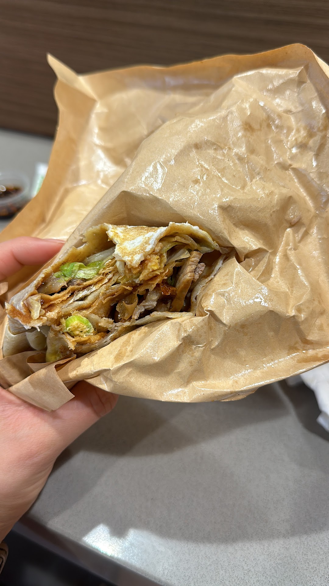 A Rolling Man Chinese pancake wrap held open